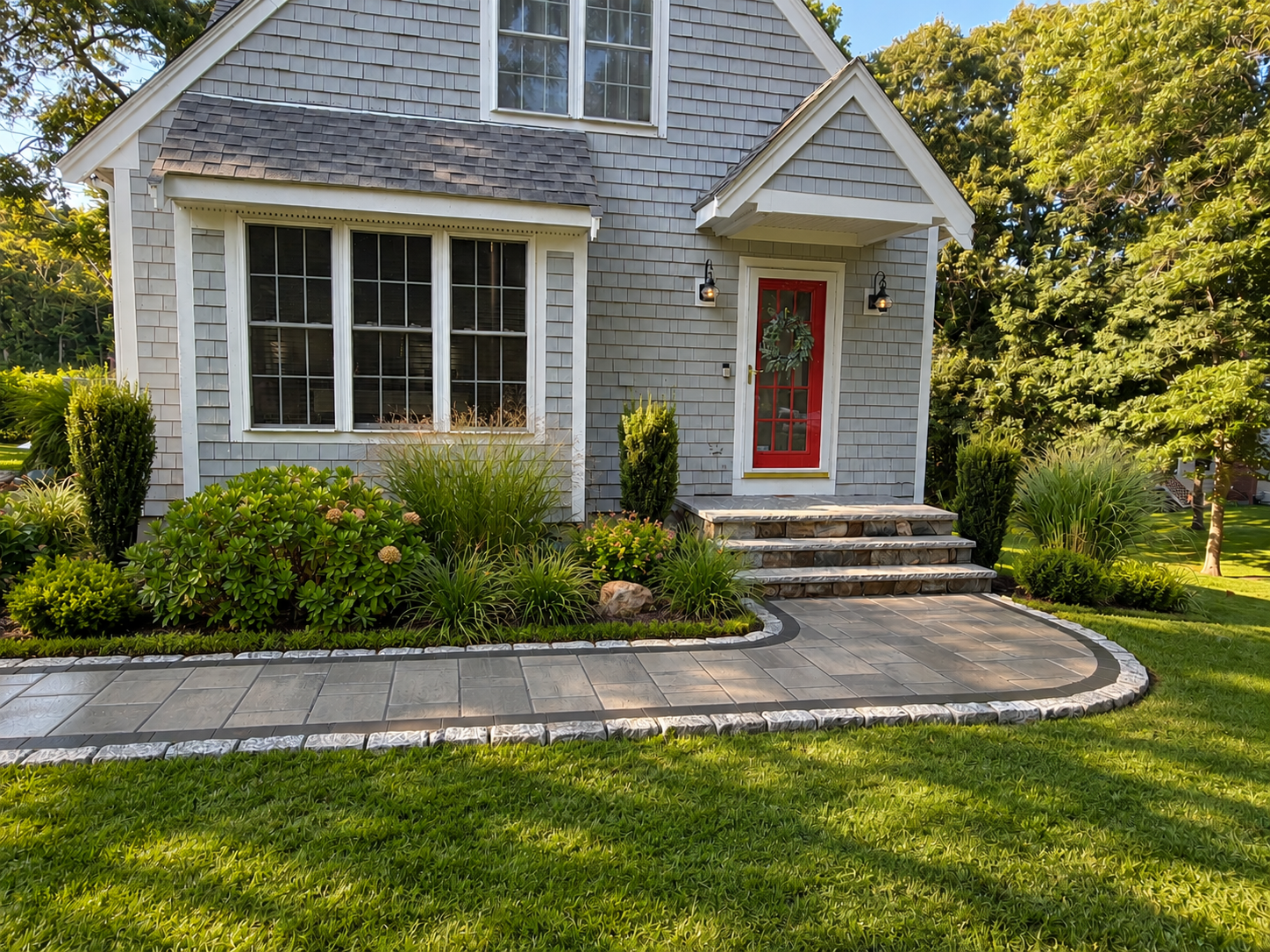Curved stone walkway with landscaping